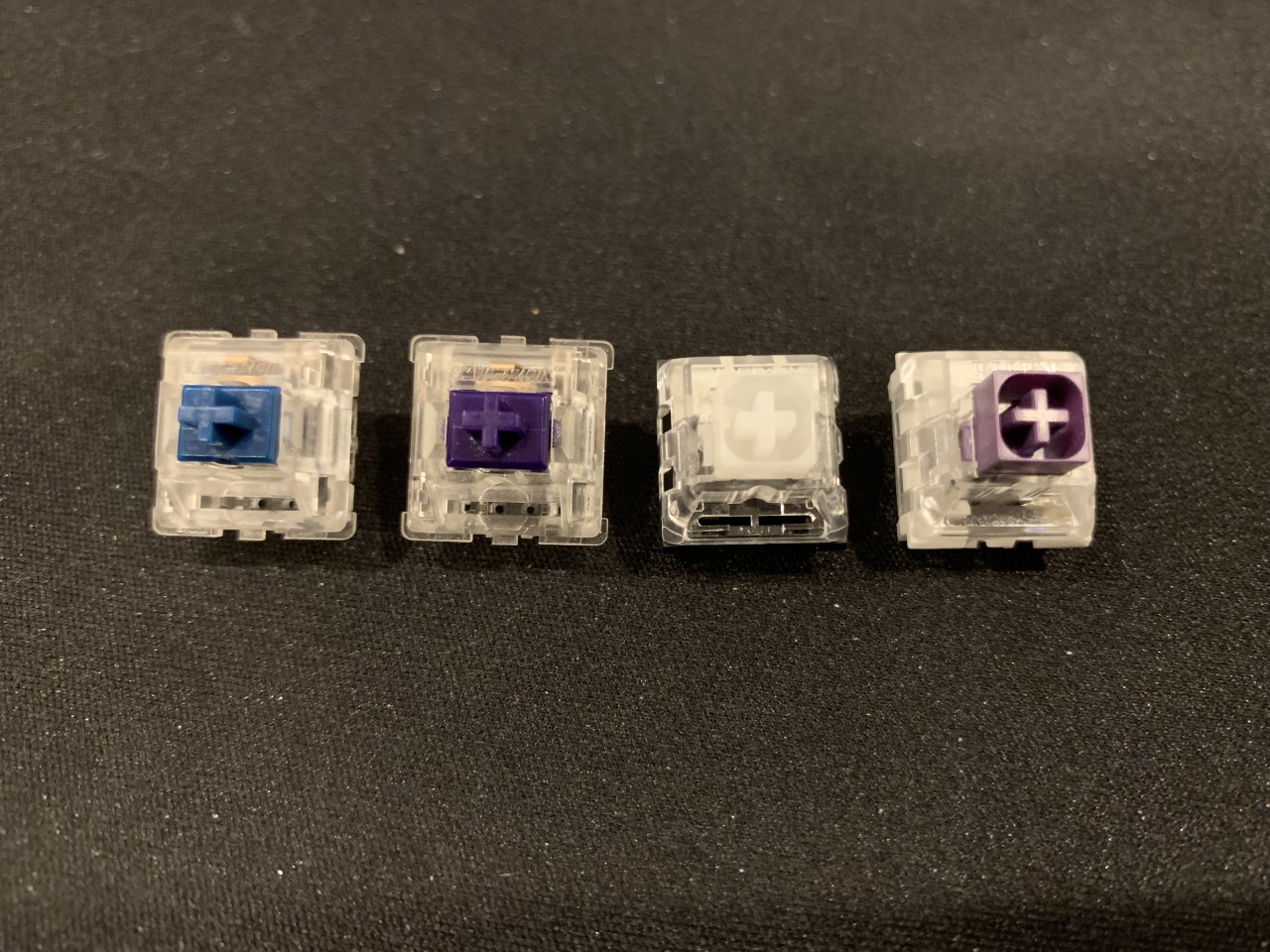 From left to right, these are the Zilent 67g, Zealio 78g, Hako Royal Clear, and Kailh Box Royal